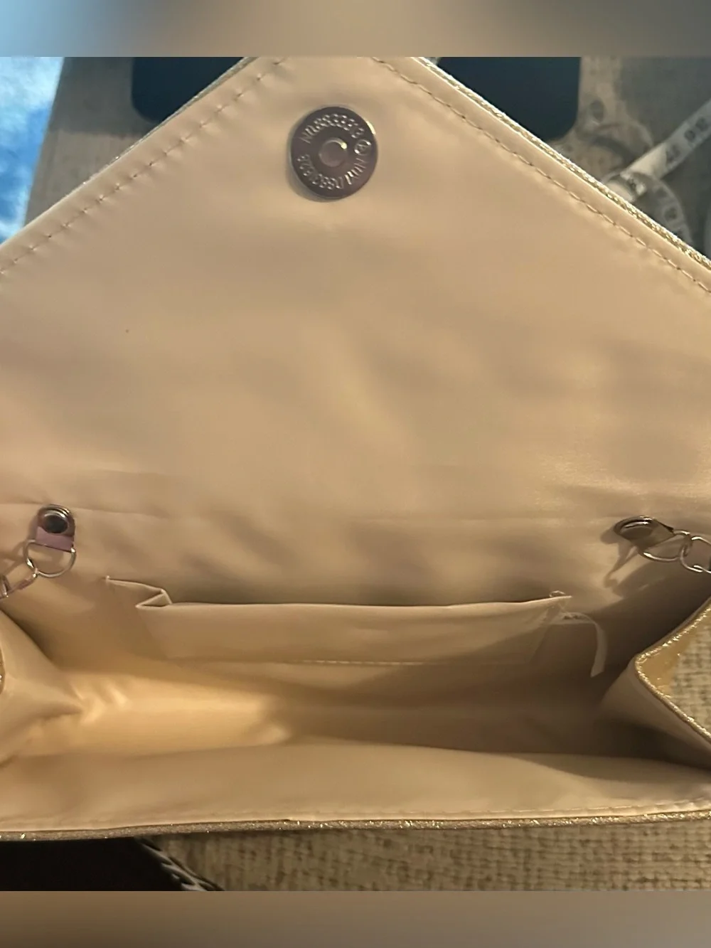 Used once. Gold Glitter Bow Chain Clutch